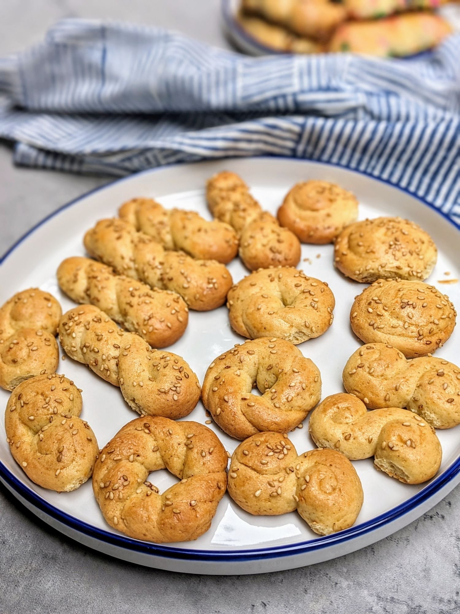 A plate of buttery Greek cookies displayed.