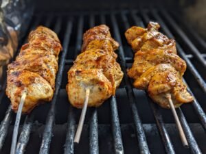 our souvlaki cooking on the grill