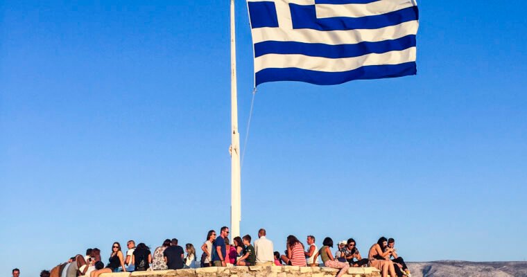 a photo of the Greek flag in the Acropolis